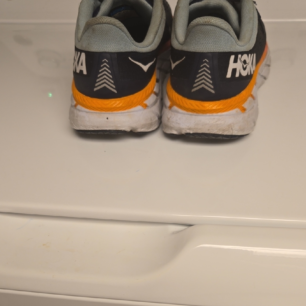 Hoka Black and Orange Athletic Shoes - Picture 2 of 4